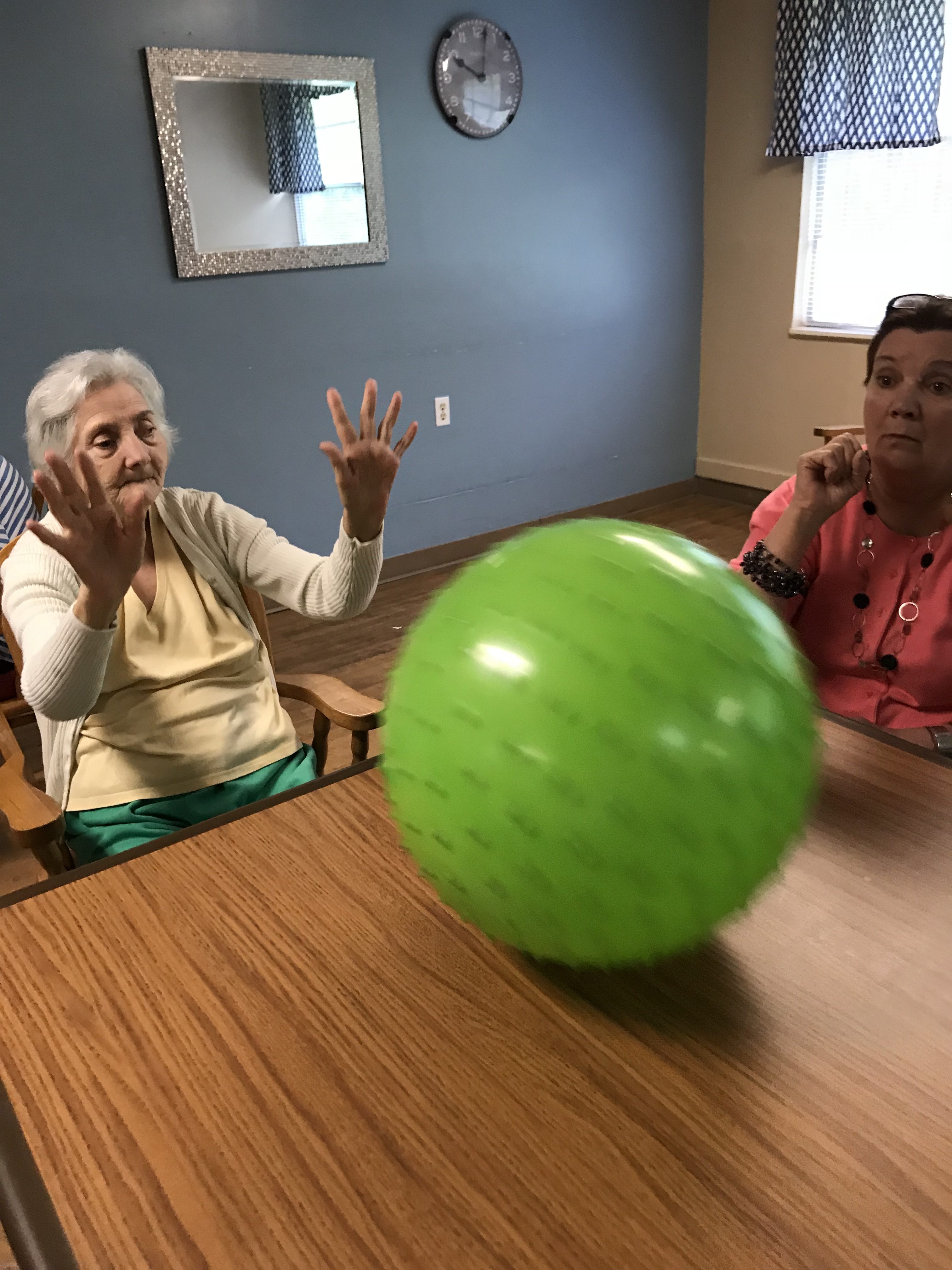 residents tossing ball