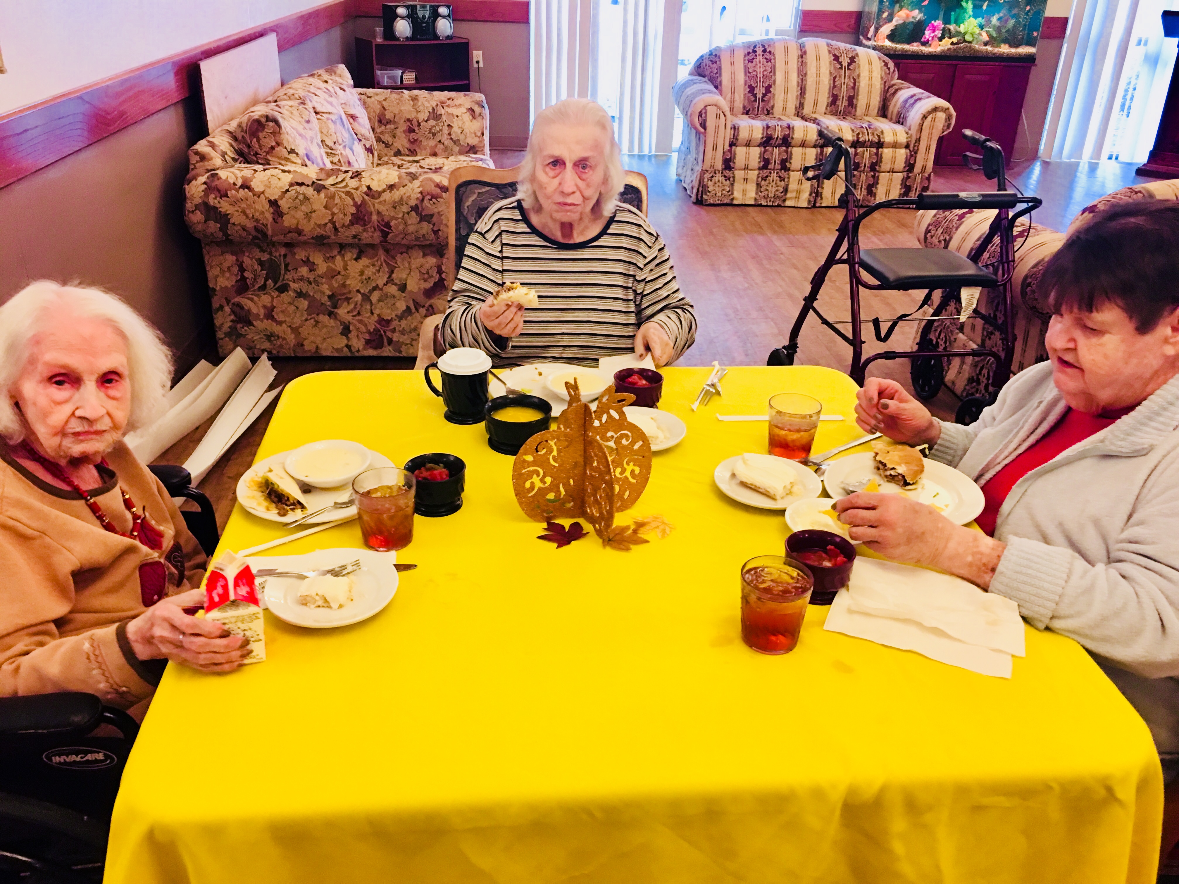 residents eating together with mexican food
