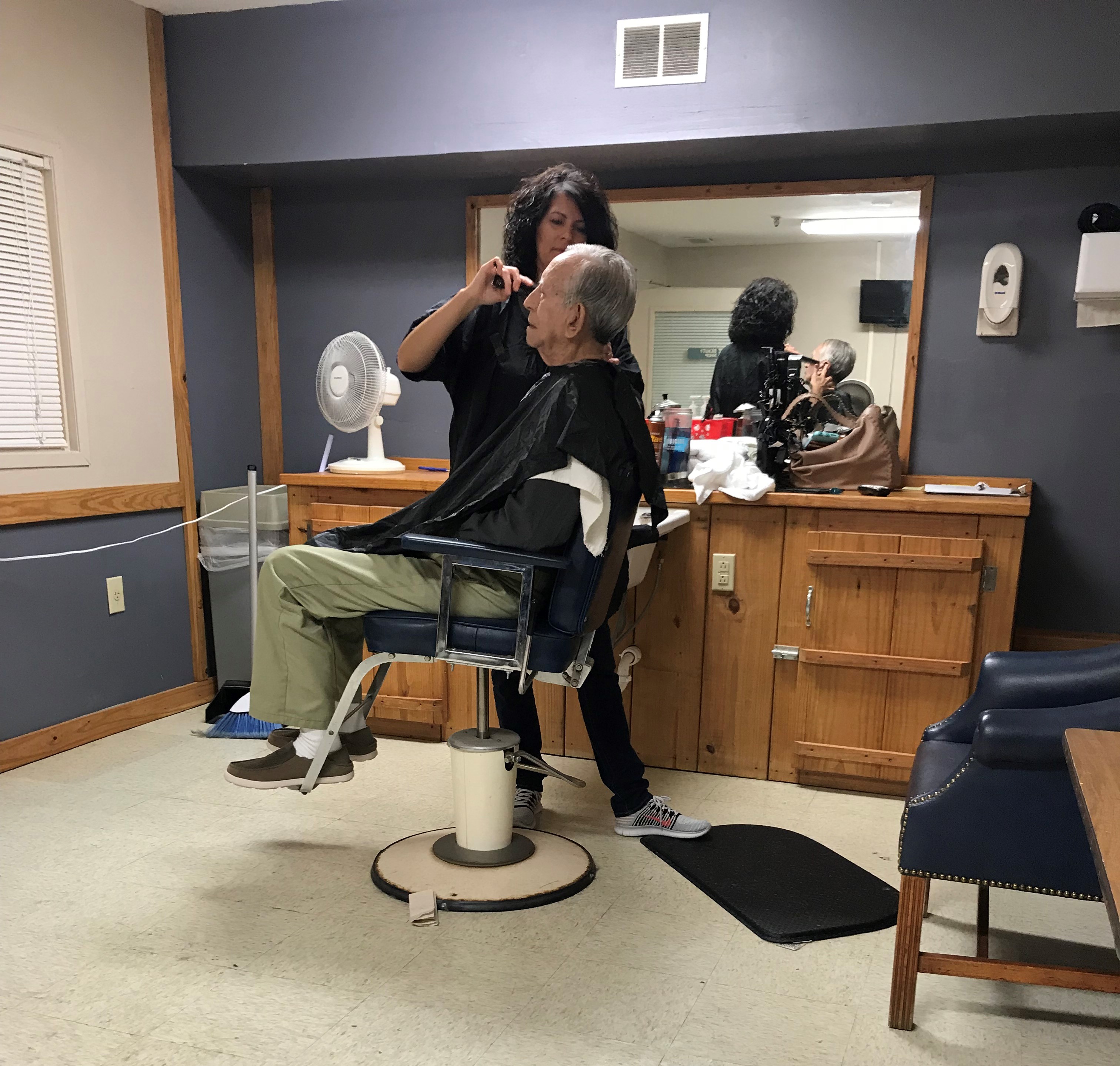 resident getting spa treatment in chair